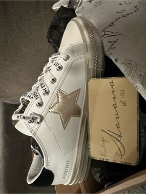 White Sneaker with Gold Star Accent